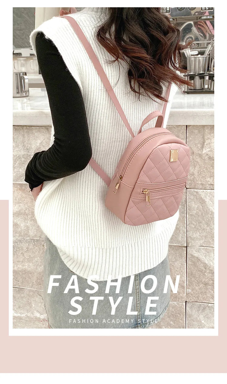 Carry your essentials in style with this fashionable women's bag. Featuring double pockets and embroidered details, this small book bag is perfect for adding a trendy touch to your outfit. -