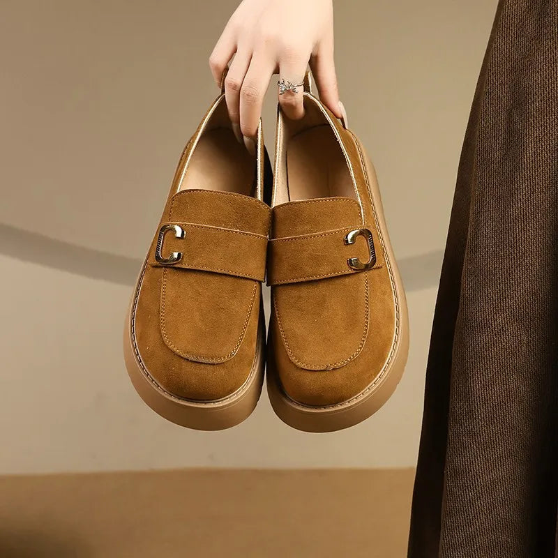 Elevate your style with these platform sole loafers for women. -