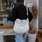 Make a stylish statement with these large shoulder bags designed for women. Crafted from soft leather, these fashionable handbags are perfect for adding a touch of sophistication to any outfit. -
