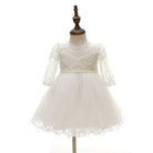 Make your baby girl shine in this elegant long-sleeve white party dress—perfect for special occasions! -