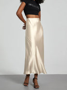 Elevate your elegance with this sleek black satin skirt for women—perfect for any occasion! -