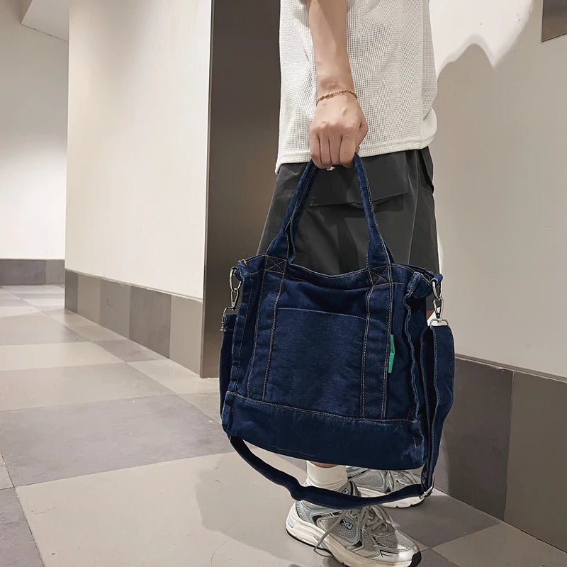 Elevate your casual look with this denim shoulder bag for women. Featuring a large design and zipper closure, this bag is perfect for shopping and everyday use, adding a touch of style to your outfit. -