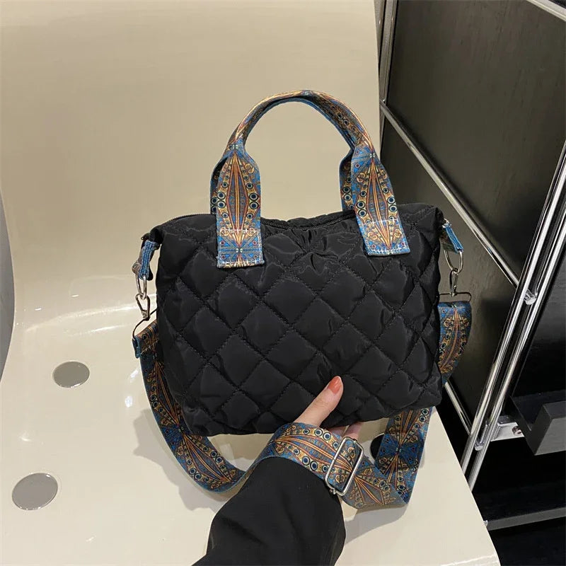 Elevate your style with these luxury designer shoulder crossbody bags for women. Featuring a quilted padded design from a top designer brand, these handbags are perfect for adding a touch of elegance to any outfit. -