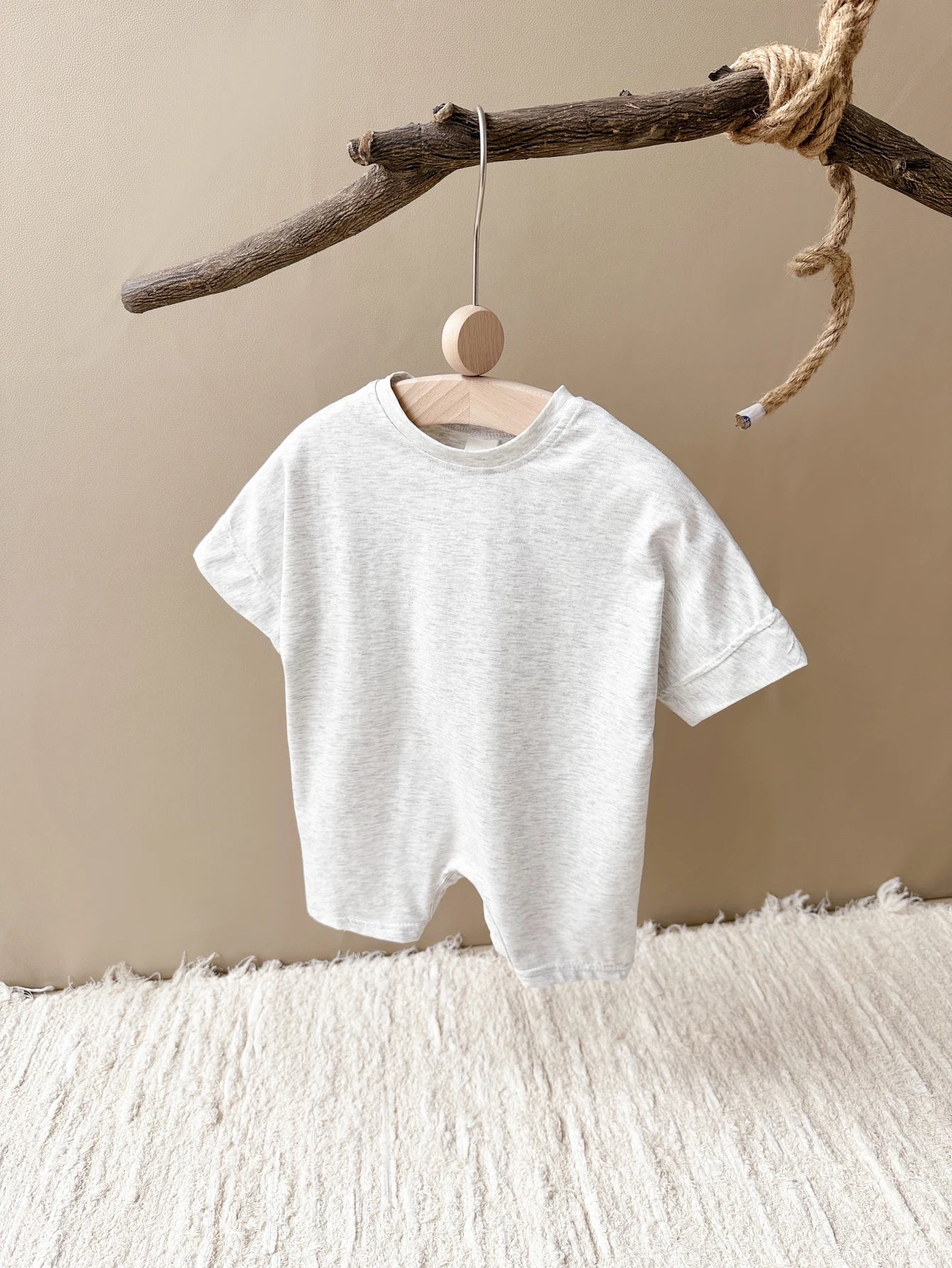 Keep your baby boy comfy and cute with this basic romper, perfect for ages 0-1 year! -