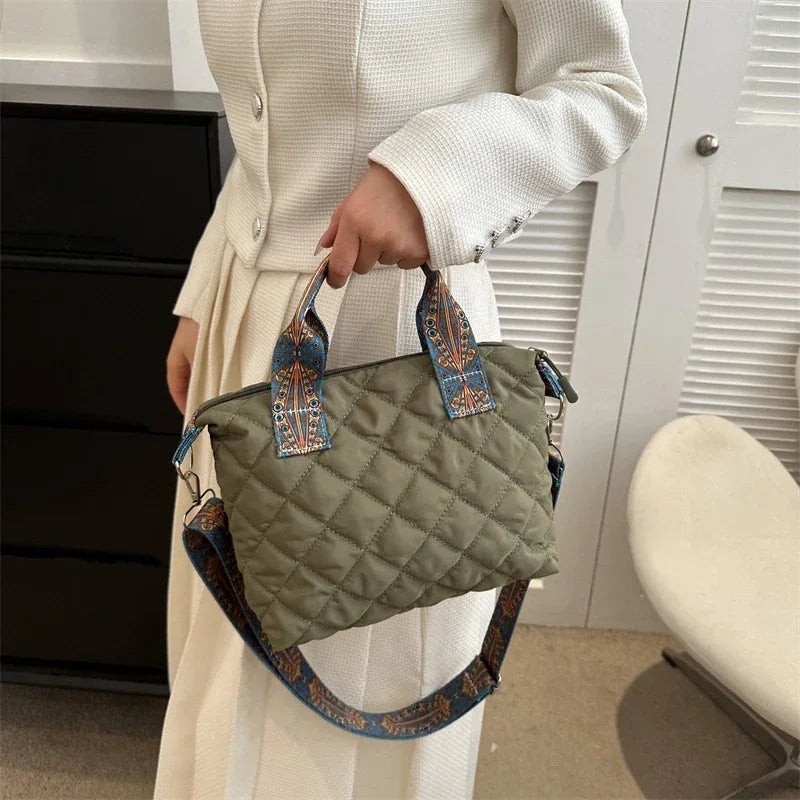 Elevate your style with these luxury designer shoulder crossbody bags for women. Featuring a quilted padded design from a top designer brand, these handbags are perfect for adding a touch of elegance to any outfit. -