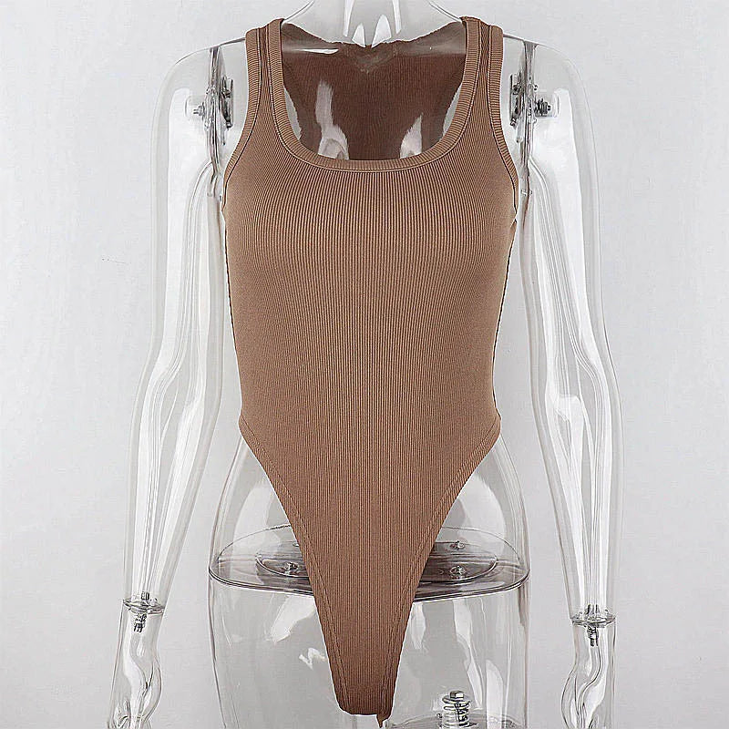 Achieve a hot and sexy look with this sleeveless knit bodysuit featuring an off-shoulder halter design. Perfect for making a stylish and alluring statement! -