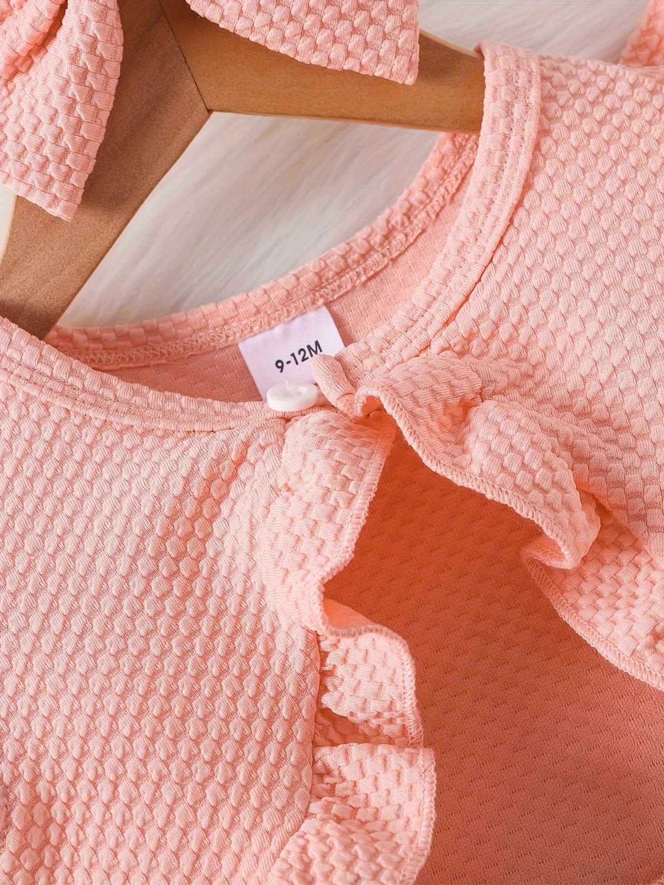 Dress your little princess in style with this pink waffle cardigan and embroidered dress set—perfect for ages 1-2 years and adding a cozy, elegant touch! -