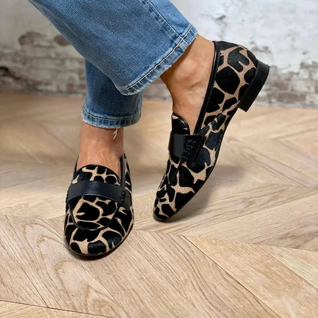 Stay both comfortable and stylish with these fashion flat heel loafers. Featuring a slip-on design, round toe, and boat shoe style, these casual shoes are perfect for women looking for both comfort and style in their footwear. -