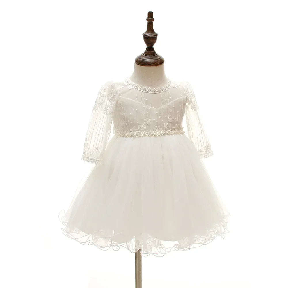 Make your baby girl shine in this elegant long-sleeve white party dress—perfect for special occasions! -