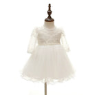 Make your baby girl shine in this elegant long-sleeve white party dress—perfect for special occasions! -
