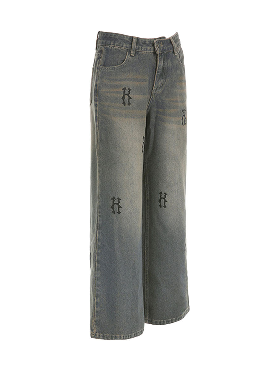 Rock the retro vibe with these baggy distressed low-rise vintage denim pants—loose, patched, and perfect for a cool mom style! -