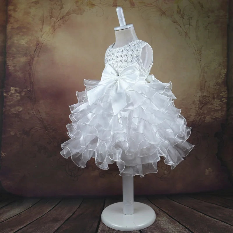 Dress your baby girl like royalty in this vintage layered princess dress—featuring pearls and perfect for infants aged 1 to 6 years! -