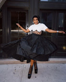 Make a bold statement with this black taffeta asymmetrical women's skirt—a chic and unique addition to your wardrobe! -