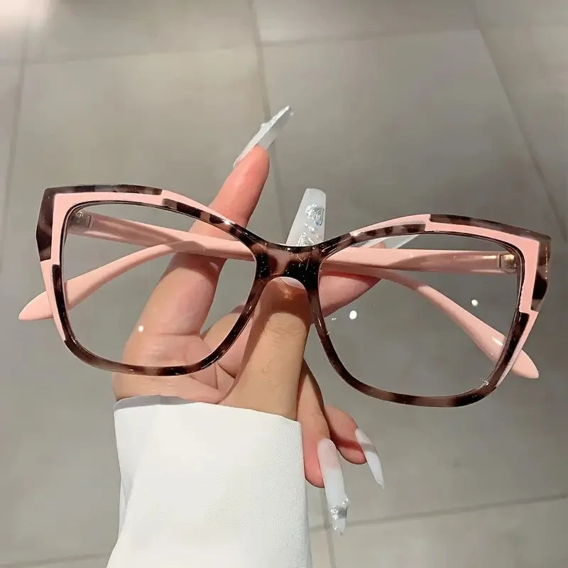 Protect your eyes with style using these cat-eye frames for women, featuring anti-blue light blocking lenses for comfortable and fashionable eyewear! -