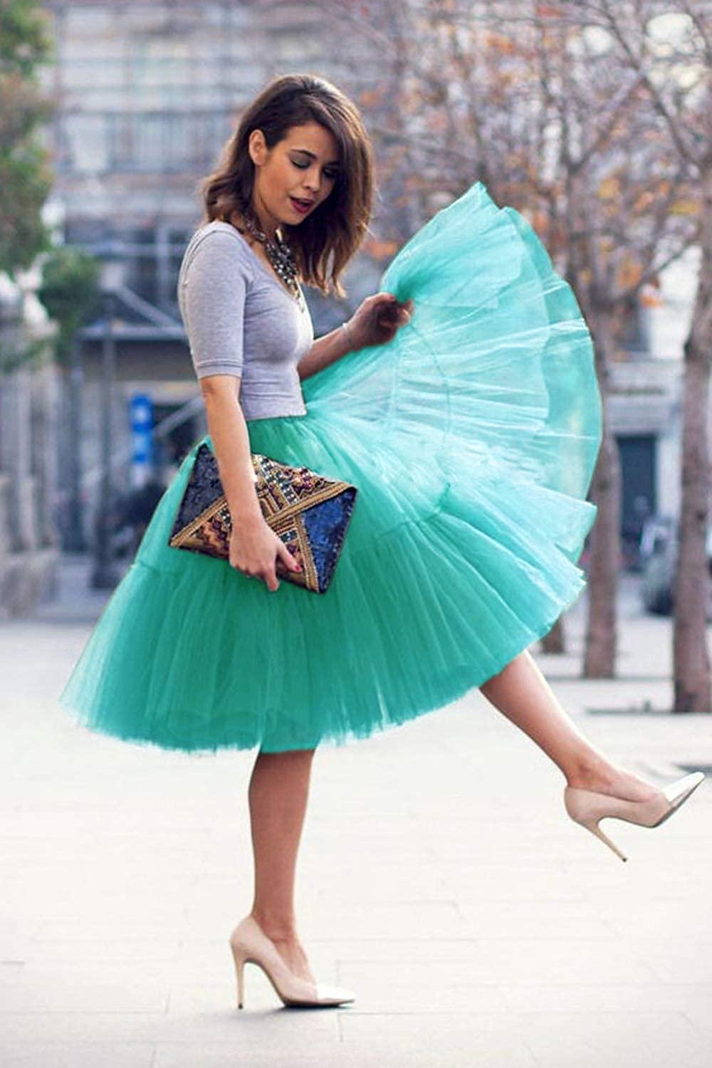 Add volume and elegance to your outfit with this knee-length underskirt—perfect for enhancing dresses and skirts for a fuller look! -