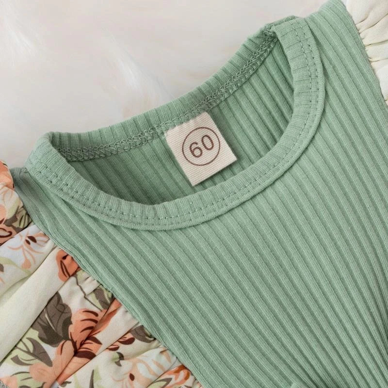 Dress your baby girl in adorable comfort with this striped cotton jumpsuit featuring a sweet bowknot—perfect for newborns! -