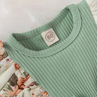 Dress your baby girl in adorable comfort with this striped cotton jumpsuit featuring a sweet bowknot—perfect for newborns! -