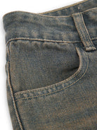 Rock the retro vibe with these baggy distressed low-rise vintage denim pants—loose, patched, and perfect for a cool mom style! -