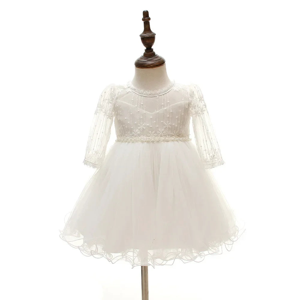 Make your baby girl shine in this elegant long-sleeve white party dress—perfect for special occasions! -