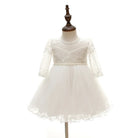 Make your baby girl shine in this elegant long-sleeve white party dress—perfect for special occasions! -