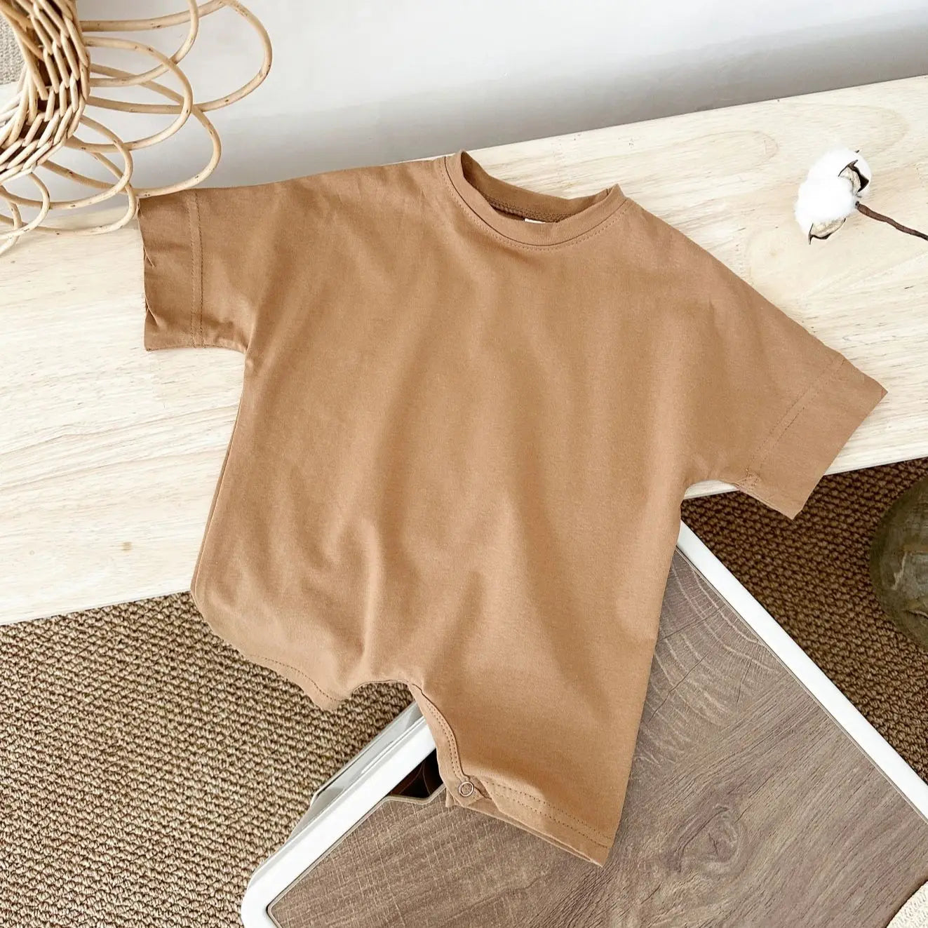 Keep your baby boy comfy and cute with this basic romper, perfect for ages 0-1 year! -