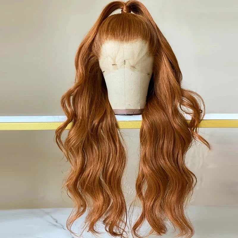 Transform your look with this ginger orange wavy hair synthetic lace front wig. With a soft and heat-resistant design, this 26-inch long wig is glueless, preplucked, and perfect glueless. -