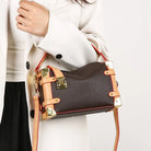 Make a statement with this luxurious and elegant box bag for women. Crafted from high-quality leather, this shoulder handbag features an elegant top-handle design, exuding sophistication and style for a classy finishing touch to your ensemble. -