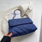 Elevate your style with this fashion luxury denim blue shoulder bag for women. Designed as a briefcase, this handbag is a chic and stylish accessory for a sophisticated and classy look. -