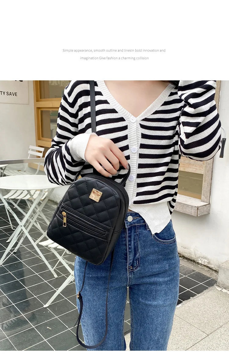 Carry your essentials in style with this fashionable women's bag. Featuring double pockets and embroidered details, this small book bag is perfect for adding a trendy touch to your outfit. -