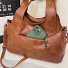 Make a statement with these luxurious handbags for women, crafted from leather and designed to be worn as shoulder bags. Elevate your style with these sac de luxe femme accessories, perfect for a chic and sophisticated look! -