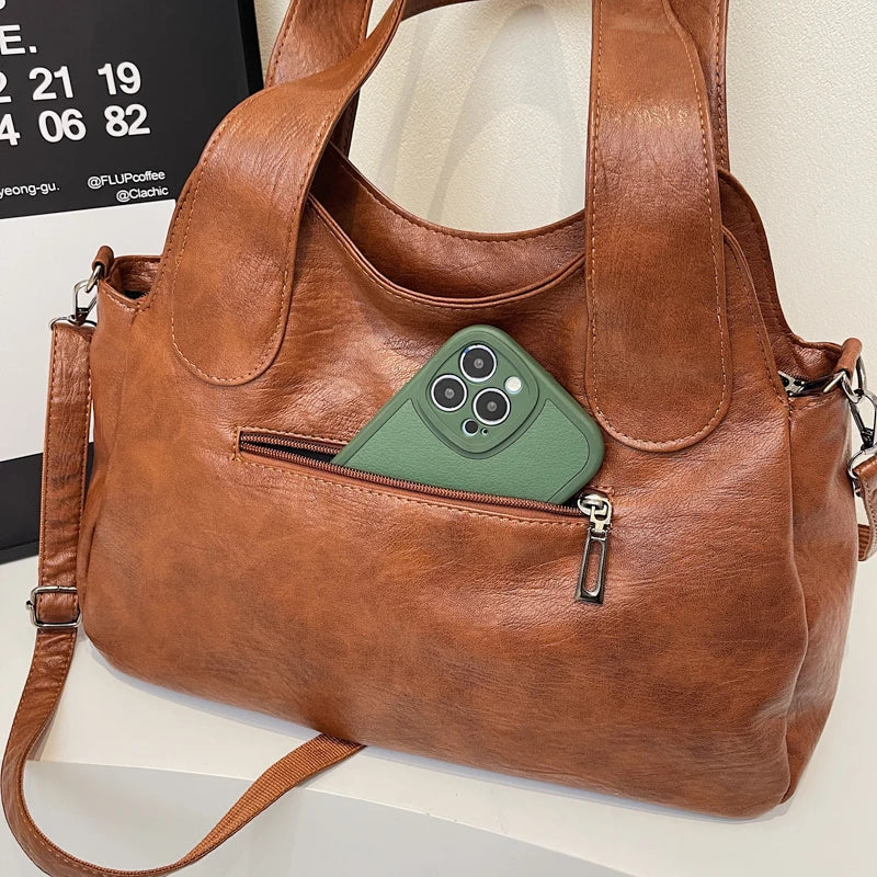Make a statement with these luxurious handbags for women, crafted from leather and designed to be worn as shoulder bags. Elevate your style with these sac de luxe femme accessories, perfect for a chic and sophisticated look! -