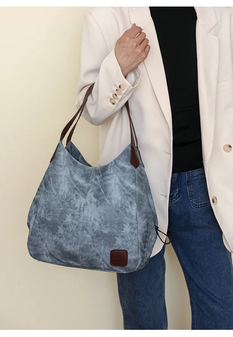 Stay organized and stylish with this large work tote bag for women. Designed with designer PU leather, this big bucket bag is perfect for carrying all your essentials in a chic and fashionable way. -