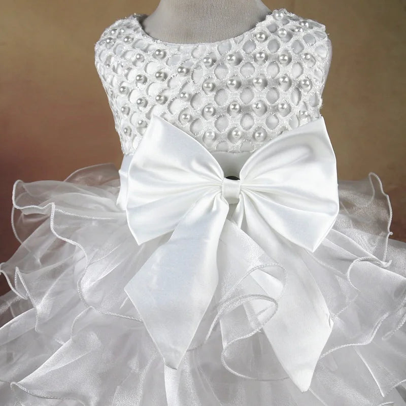 Dress your baby girl like royalty in this vintage layered princess dress—featuring pearls and perfect for infants aged 1 to 6 years! -