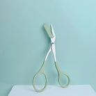 Eyebrow trimming scissors with built-in comb -