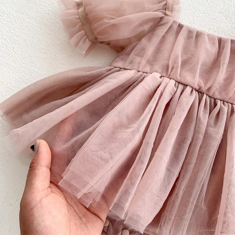 Dress your toddler in sweet style with this new baby lace dress featuring a big bowknot and short sleeves—perfect for special occasions! -
