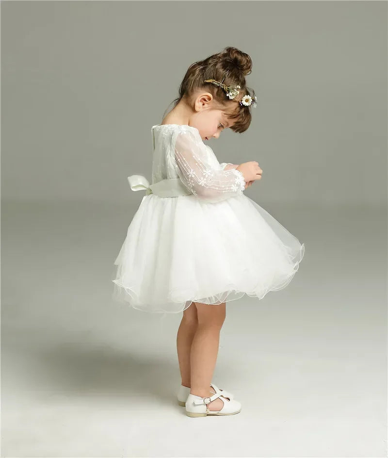 Make your baby girl shine in this elegant long-sleeve white party dress—perfect for special occasions! -
