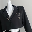 Make a statement with these loose-fit blazers for women featuring trendy chain designs—fashion-forward and effortlessly chic! -