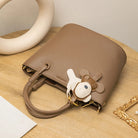 Upgrade your accessories with this new bucket bag for women. Featuring a fashionable and versatile design, this handheld bag is perfect for adding a chic and trendy touch to your look. -