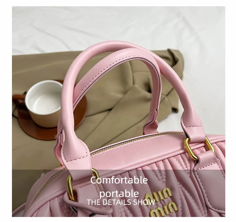Stay stylish and organized with this new women's small square bag. With a versatile design that allows for multiple carrying options, this crossbody tote is perfect for daily use, providing both fashion and functionality in one chic accessory. -
