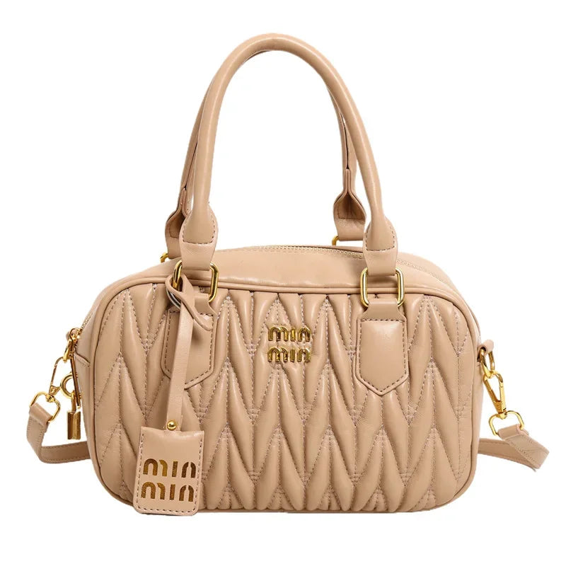 Stay stylish and organized with this new women's small square bag. With a versatile design that allows for multiple carrying options, this crossbody tote is perfect for daily use, providing both fashion and functionality in one chic accessory. -