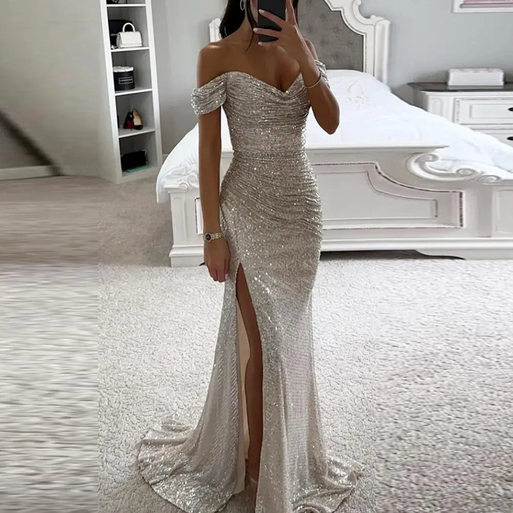 Dazzle in style with this sequin pleated maxi dress featuring short sleeves and a waist-tight silhouette—perfect for showcasing sophistication and glamour! -