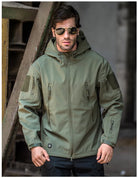Stay prepared for any weather conditions with this tactical windproof and waterproof jacket for men. This versatile and durable jacket is perfect for outdoor activities and ensuring optimal protection from the elements. -