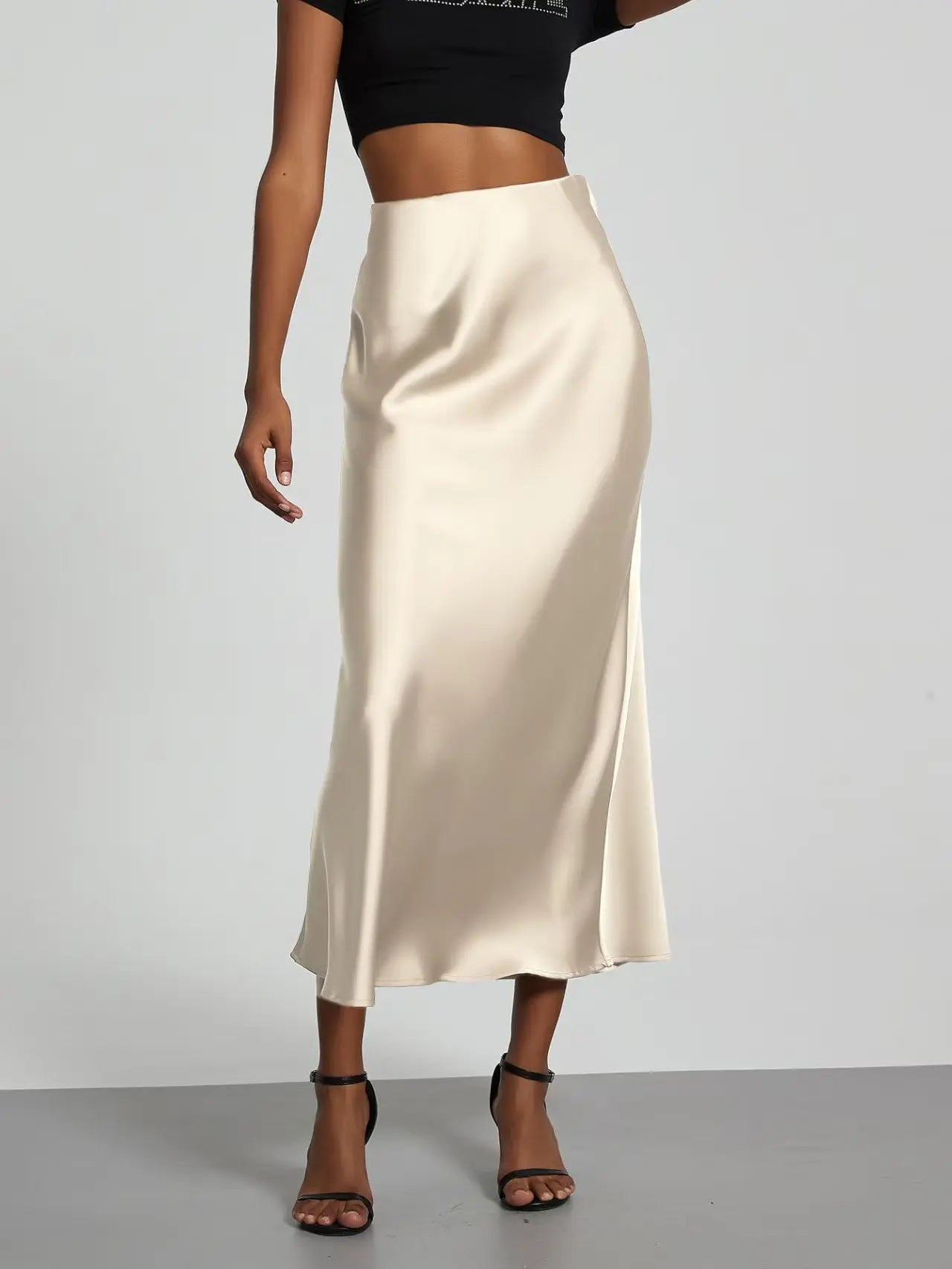 Elevate your elegance with this sleek black satin skirt for women—perfect for any occasion! -