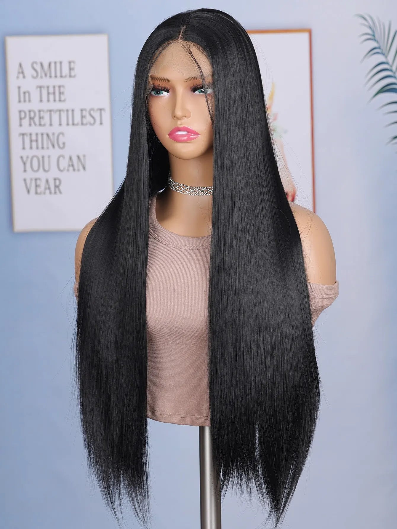 Enhance your style with this 24-inch straight lace front wig. Featuring a sleek black color, this wig is suitable for daily wear, providing a stylish and effortless look. -