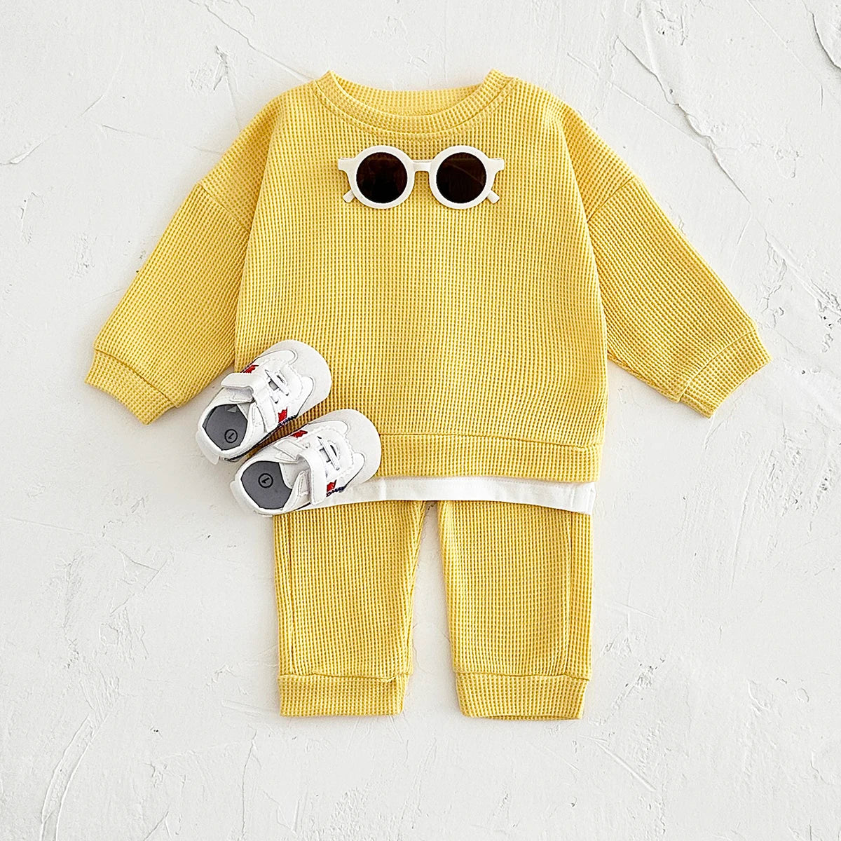 Dress your little one in comfort with this new baby clothes set—featuring a loose waffle cotton tracksuit perfect for kids on the move 0-3 Years Old -