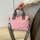 Elevate your style with these luxury designer shoulder crossbody bags for women. Featuring a quilted padded design from a top designer brand, these handbags are perfect for adding a touch of elegance to any outfit. -