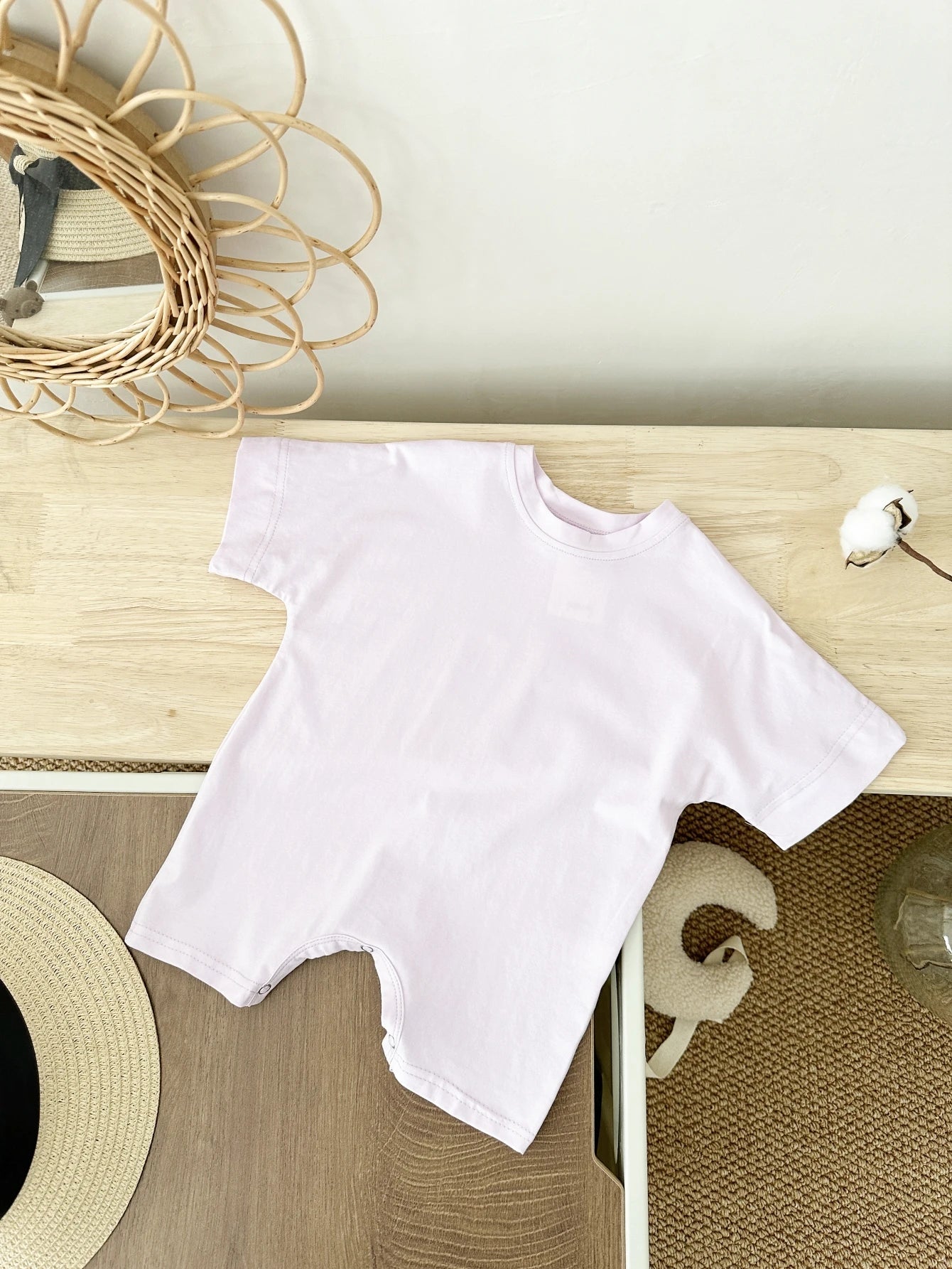 Keep your baby boy comfy and cute with this basic romper, perfect for ages 0-1 year! -
