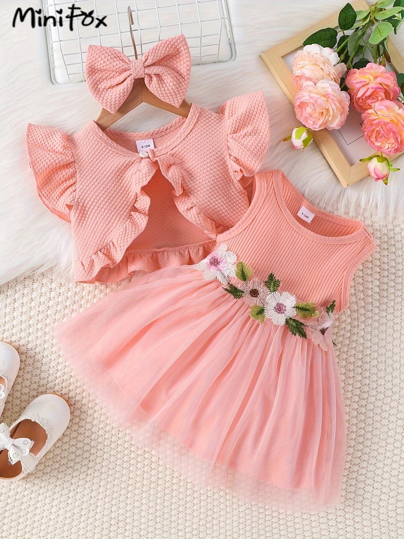 Dress your little princess in style with this pink waffle cardigan and embroidered dress set—perfect for ages 1-2 years and adding a cozy, elegant touch! -
