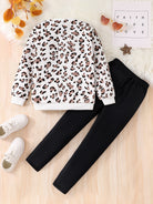 2 pieces fashion set leopard print round neck long sleeve top; solid color slim fit pants. -