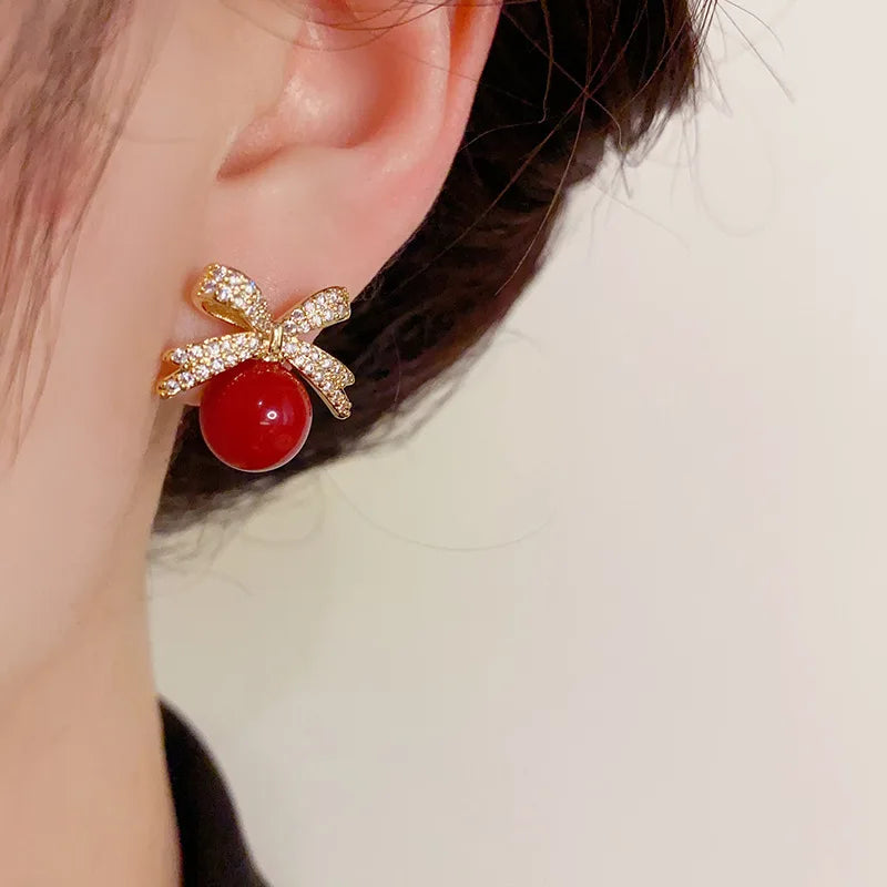 Sparkling Rhinestone Bow Pearl Stud Earrings -